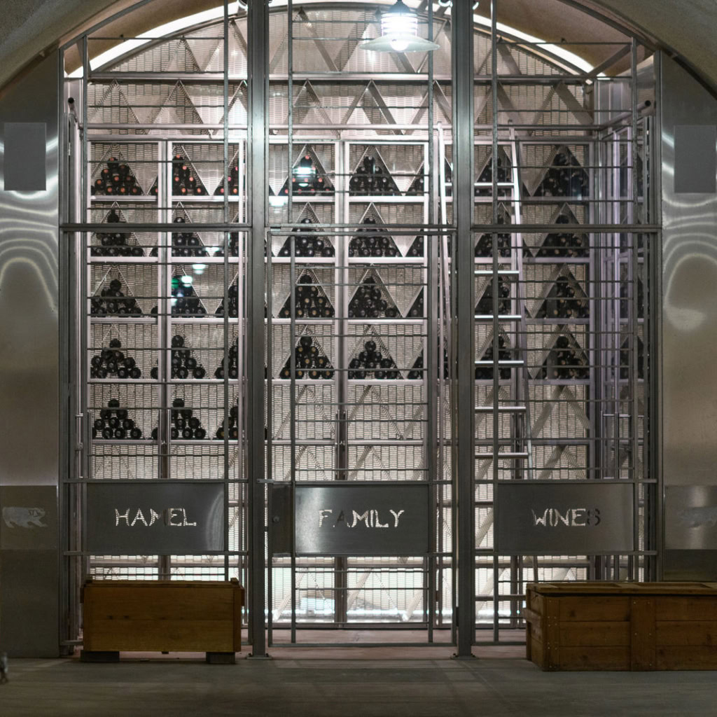 Wine bottles in cage