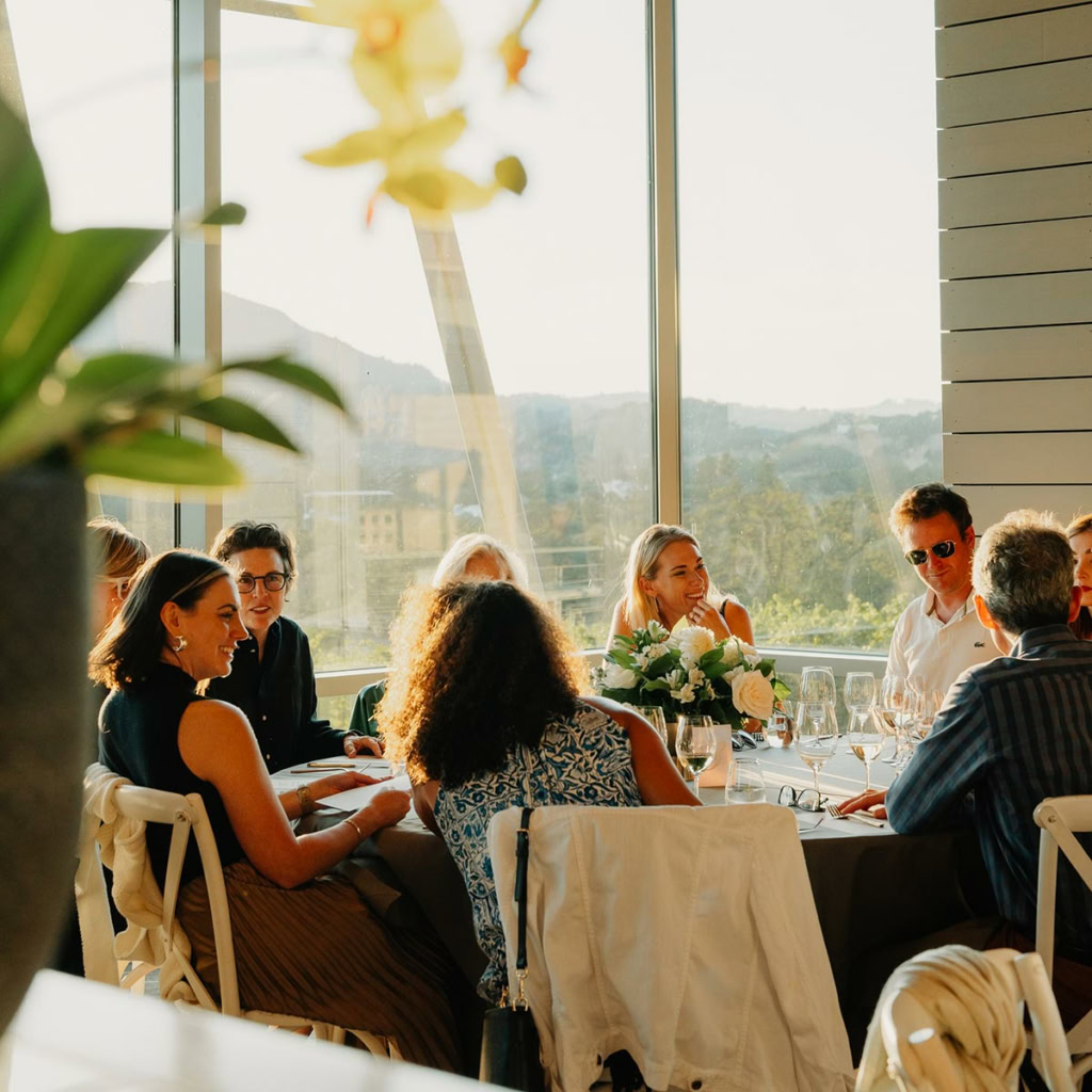 People enjoying wines and company